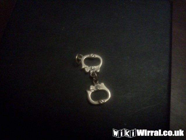 Attached picture hand cuff pendant.jpg